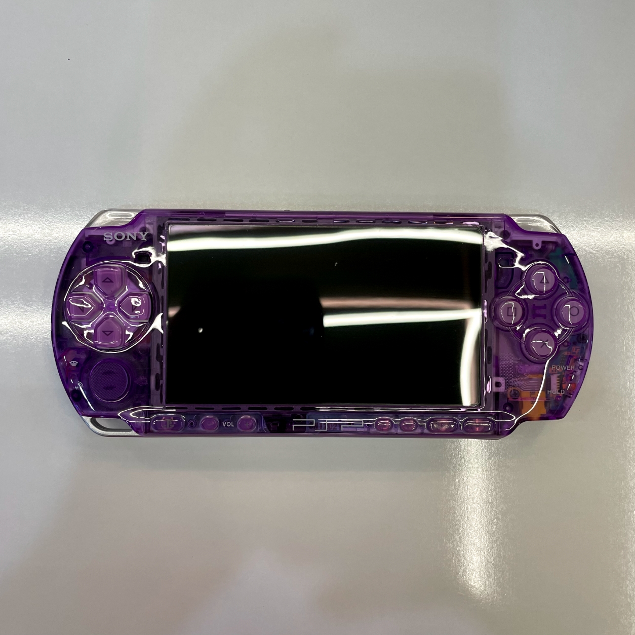 کنسول دستی سونی PSP 3000 کاستوم شفاف بنفش